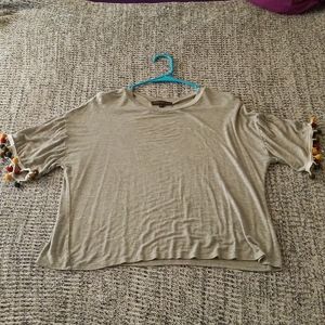 M blouse with pom poms